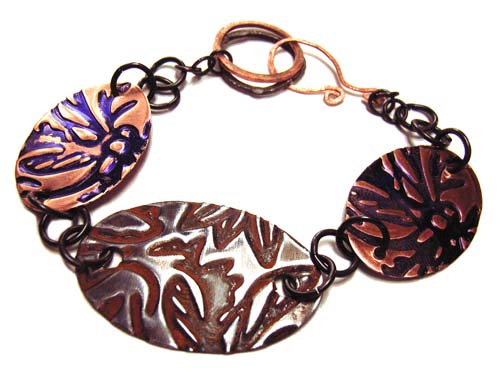 Bracelet shows Copper Blanks with Violet Kuretake Alcohol Ink and Vintaj Arte Metal with Rust Gilders Paste